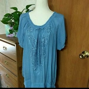 Beautifu blue blouse with lace front.